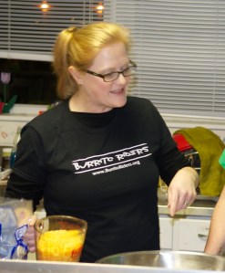 My lovely wife, Amanda, directing the kitchen