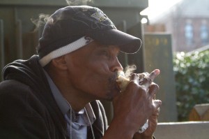 Mel enjoying a steaming burrito on a cold morning